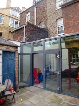 External view 1 of the glazed sunroom house extension by mbo architects york